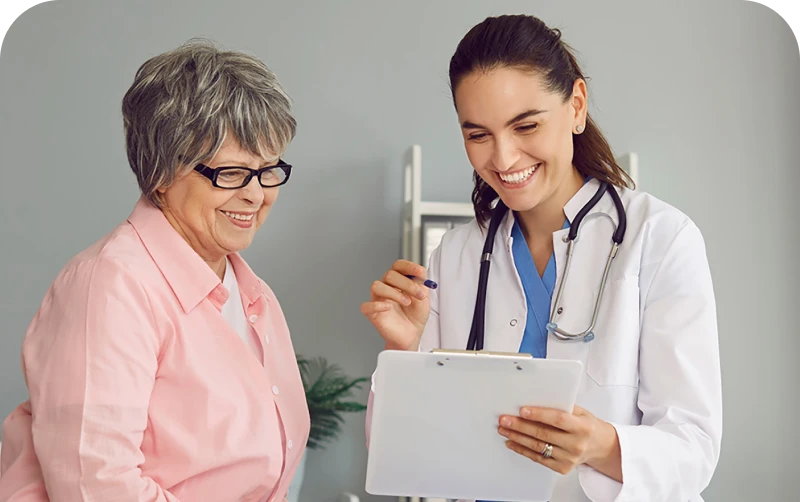 Healthcare professional reviewing information with a patient