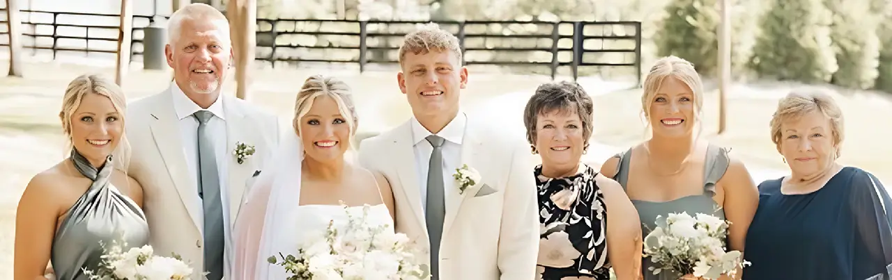 Carla, in floral dress Celebrates a joyful moment with family at her daughter Leslie's wedding last year