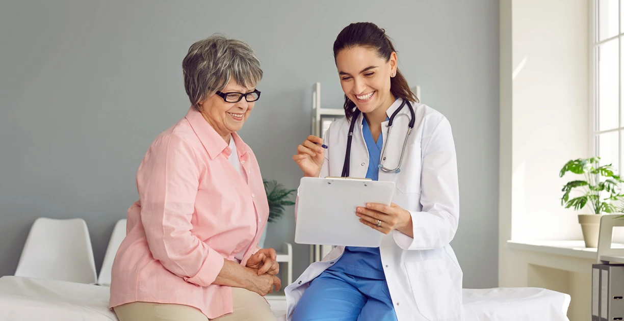 Healthcare professional reviewing information with a patient