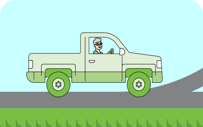 A cartoon-style truck with green wheels drives on a hill, with an elderly man in the driver's seat, wearing glasses and a hat